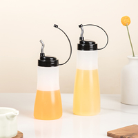 Botellas exprimibles con tapa negra, paquete de 2, contenedor de condimentos recargable a prueba de fugas para uso en la cocina
