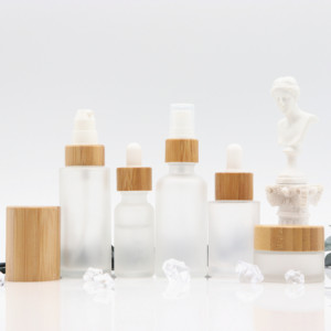Flacone contagocce in vetro vuoto all'ingrosso flacone di siero <span class=keywords><strong>gelo</strong></span> rotondo flacone di olio essenziale da 30ml con tappo in bambù - Product Image 1