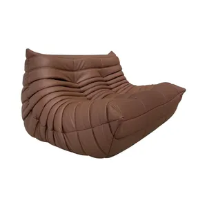 复古皮革褶沙发套客厅模块化组合多哥地板沙发，带织物躺椅和炉边椅