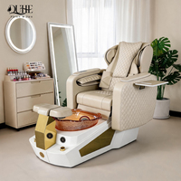 Fauteuil de pédicure électrique de luxe moderne pour salon, avec massage et drainage automatique, idéal pour manucure et soins des pieds.