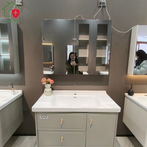 ตู้ห้องน้ำ MDF สีขาวสไตล์หรูหราพร้อมกระจกอัจฉริยะแบบมีไฟ ดีไซน์มุมฉาก ติดผนัง - Product Image 5
