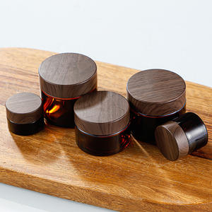 Vendita calda 5g 10g 15g 20g 30g 50g 100g confezione cosmetica per la cura del viso marrone ambra vasetto di crema di vetro cosmetico con coperchio in legno scuro - Product Image 1