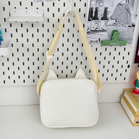 Vente en gros pas cher sac messager en nylon mignon oreille de chat fenêtre transparente affichage des broches Ita sacs à bandoulière sac à main latéral pour les filles