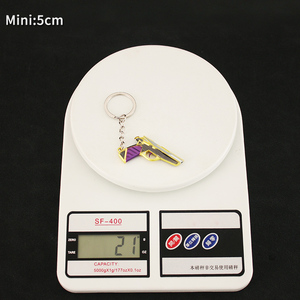Llavero Clásico Prime de Valorant, Diseño Dorado y Morado con Grabado en Relieve, para Colección de Gamers y Pequeño Regalo Navideño - Product Image 4