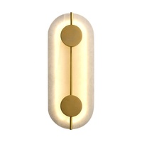 Applique murale LED moderne de luxe en cuivre avec design créatif en marbre pour le salon, la chambre à coucher et l'éclairage de l'allée de l'hôtel