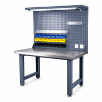 Banc de travail multifonctionnel robuste en acier inoxydable pour assemblage industriel, avec panneau perforé pour affichage d'outils, pour production en usine