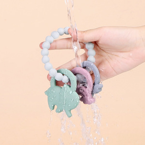 Pulsera de silicona para la dentición con forma de elefante, arcoíris y luna para bebés de 3 meses en adelante, unisex - Product Image 4