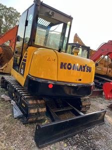 Excavatrice hydraulique Komatsu PC56-7 d'occasion en excellent état, avec châssis robuste et godet standard - Product Image 3