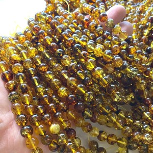 Vente en gros de perles d'ambre mouchetées de haute qualité de 6, 8 et 10 mm, perles rondes en pierre semi-précieuse pour la fabrication de bijoux DIY - Product Image 4