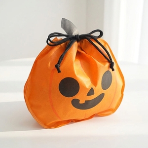 Sac cadeau non tissé à cordon de serrage orange pour citrouille, pochette réutilisable en plastique pour bijoux, idéal pour les cadeaux de fête d'Halloween - Product Image 1