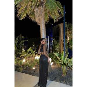Ensemble de costume noir brillant pour femmes - Product Image 1