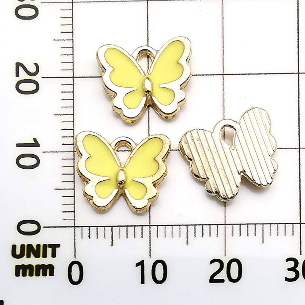 1 papillon jaune dégoulinant d'huile - 0,5g - 12*11mm - 12495