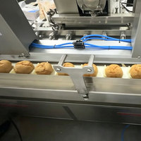 Machine de remplissage automatique de crème pour choux commerciale et industrielle, équipement de transformation alimentaire avec fonction de remplissage et d'injection