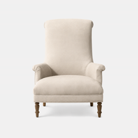 Fauteuil de luxe moderne en cuir avec accoudoirs plissés, dossier haut allongé à motifs festonnés et structure en bois