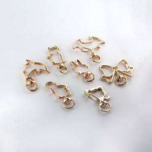 3 Colors Creative Keychain Five-pointed Star Moon Dolphin Cherry Blossom cat Heart-shaped Alloy DIY Keychain Accessory - Product Image 3