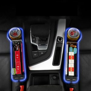 Boîte de rangement de <span class=keywords><strong>voiture</strong></span> multifonctionnelle en cuir avec lumière ambiante et port de charge USB applicable aux deux côtés du siège - Product Image 1