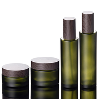 Ensemble d'emballages cosmétiques en verre vert foncé mat avec couvercle en bois, flacon pompe vide pour lotion, pot de crème pour le visage, personnalisable avec logo