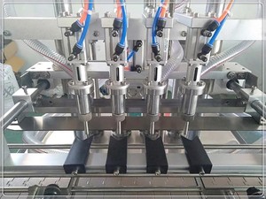 Machine de remplissage automatique à quatre buses Brenu pour pots de crème en pâte de miel à l'huile de camélia-Solution efficace pour les boissons en vrac Fillig - Product Image 3