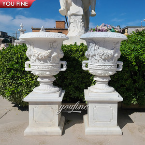 YOUFINE Coppia di Urne Decorative in Marmo Bianco Naturale con Rilievo di Cherubini e Fiori, Vaso in Pietra Intagliata a Rosa con Piedistallo Quadrato per Giardino e Villa - Product Image 2