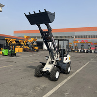 Mini-chargeuse sur pneus électrique CE EPA 800 kg, alimentée par batterie, 4x4, avec pelle avant, haute efficacité pour les travaux agricoles et de jardinage