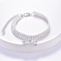 Collier Classique Hip-hop pour Animaux de Compagnie du Fabricant avec Strass et Motif Os, Chaîne pour Chiens et Chats Toutes Saisons