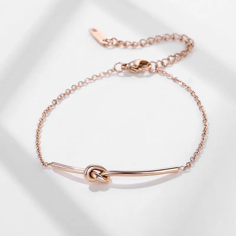 Designer Minimalist Love Knot Charm Gold Plated Stainless Steel Bracelet For Women And Girls