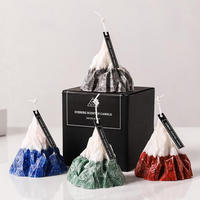 Wunderschönes Design Hochwertige Bergförmige Weihnachts-Duftkerze mit Prägung und Verpackung