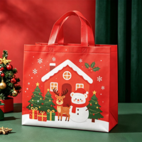 Stock disponible sacs de Noël sur le thème non tissé logo personnalisé conception de père noël rouge vert promotion de sacs-cadeaux de festival