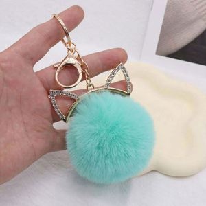 Porte-clés de luxe mignon avec oreilles de chat et pompon, boule de fourrure moelleuse, jouet en peluche, pendentif de sac, cadeau, porte-clés en strass - Product Image 2