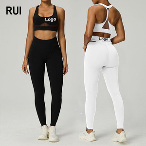 ชุดโยคะ 2 ชิ้น เสื้อชั้นในกีฬาไร้ตะเข็บ ระบายอากาศได้ดี น้ำหนักเบา ผ้าตาข่าย สำหรับผู้หญิง ฤดูร้อน ขายส่ง RUIQUWIN พร้อมกางเกงเลกกิ้งเอวสูง - Product Image 1