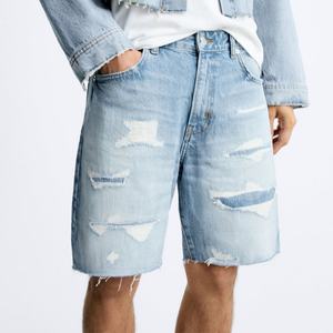 Shorts en jean déchirés pour hommes, nouveau design, délavage bleu, logo personnalisé, prix d'usine - Product Image 1