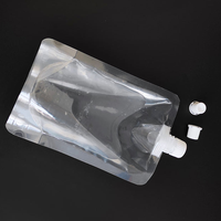 Vente en gros de sachets à bec verseur en PET/PA/PE de qualité alimentaire, biodégradables et recyclables, transparents, de 500 ml à 2 L, pour le lait, avec bec verseur liquide transparent