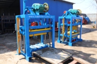 FUDA approvisionnement direct d'usine petite machine de fabrication de briques à emboîtement électrique manuelle pour béton de cendres volantes