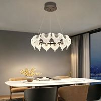 Lustre LED en cristal réglable avec système de suspension, finition dorée, intensité variable, garantie 3 ans, idéal pour salon et mariages