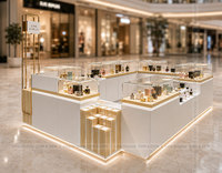 Kiosque de présentation de parfums professionnel et élégant, style vitrine, blanc et or, écologique, durable, avec éclairage LED pour centre commercial