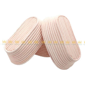 Cestas de prueba de ratán Natural de forma ovalada Vietnam Cesta de almacenamiento hecha a mano versátil Natural Cesta de pan - Product Image 1