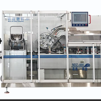 Cartonneuse automatique NDZ400 : Ouverture, alimentation, emballage, impression par lots et fermeture de cartons. Pour les ampoules, les bouteilles et les tubes.