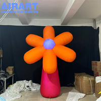 Grand ballon gonflable en forme de fleur rose à motif œil de chat, fleur gonflable géante personnalisée pour la décoration de parcs d'art public en extérieur