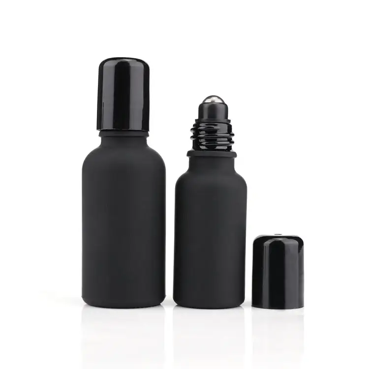 Custom 10ml 20ml 30ml 50ml 100ml matte black roll on massage empty glass roller ball bottles with child resistant lid