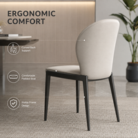 Chaise de salle à manger élégante et commerciale, rembourrée, dossier ovale beige, avec structure en métal noir, pour restaurant, hôtel, hôtellerie
