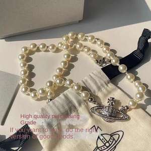 Nouvelle Arrivée : Collier Saturne Empress Dowager Haut de Gamme, Pendentif Planète Rétro Entièrement Sertie de Diamants, Chaîne Sportive en Titane Unisexe Motif Bambou - Product Image 4