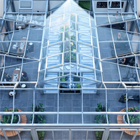 Conservatoire moderne à structure en aluminium : Solution complète de design et de décoration intérieure pour bâtiments commerciaux