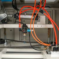 Machine d'emballage sous film rétractable en L entièrement automatique pour boîtes