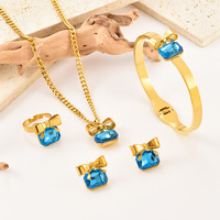 Ensemble de bijoux tendance pour femmes en acier inoxydable 316 et cristal, nœud papillon en strass, collier, bracelet, boucles d'oreilles, bague - plaqué or 18 carats