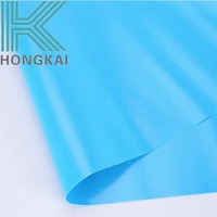 Tissu Air Dancer en PVC tricoté warp 1000D 20x20 imperméable bleu lac thème océan pour événements aquatiques