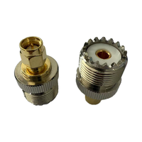 Adaptador de buena calidad SMA/UHF hembra a conector adaptador macho SMA