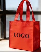 L'usine source vend des sacs à main en tissu tissé personnalisables, écologiques, réutilisables et portables, fabriqués en interne, pour le shopping.