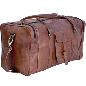 Haga que el empaque sea sencillo con esta bolsa de lona 100% de cuero genuino que ofrece un amplio acceso, base estructurada y correa cómoda. - Product Image 3