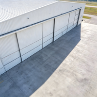 Hangar Prefabricado de Acero Galvanizado en Caliente para Aviones Privados, Paneles Aislantes de Doble Capa, Diseño Moderno, Resistente al Fuego