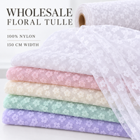 Tissu en tulle floqué floral en gros, maille en nylon tricotée à cinq pétales pour robe de mariée, costume de mode, couture DIY